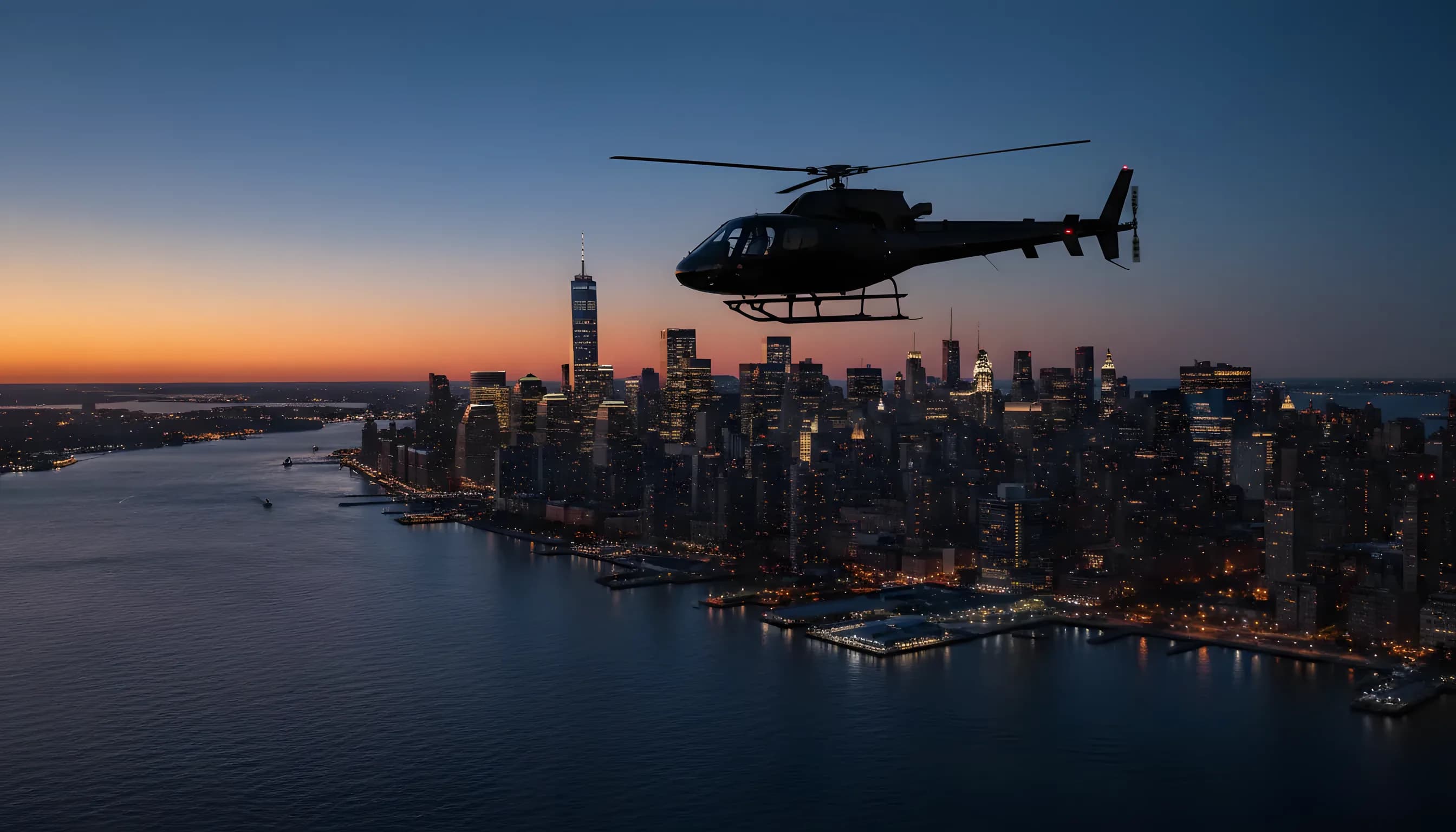 A helicopter flies toward the illuminated Manhattan skyline at dusk.