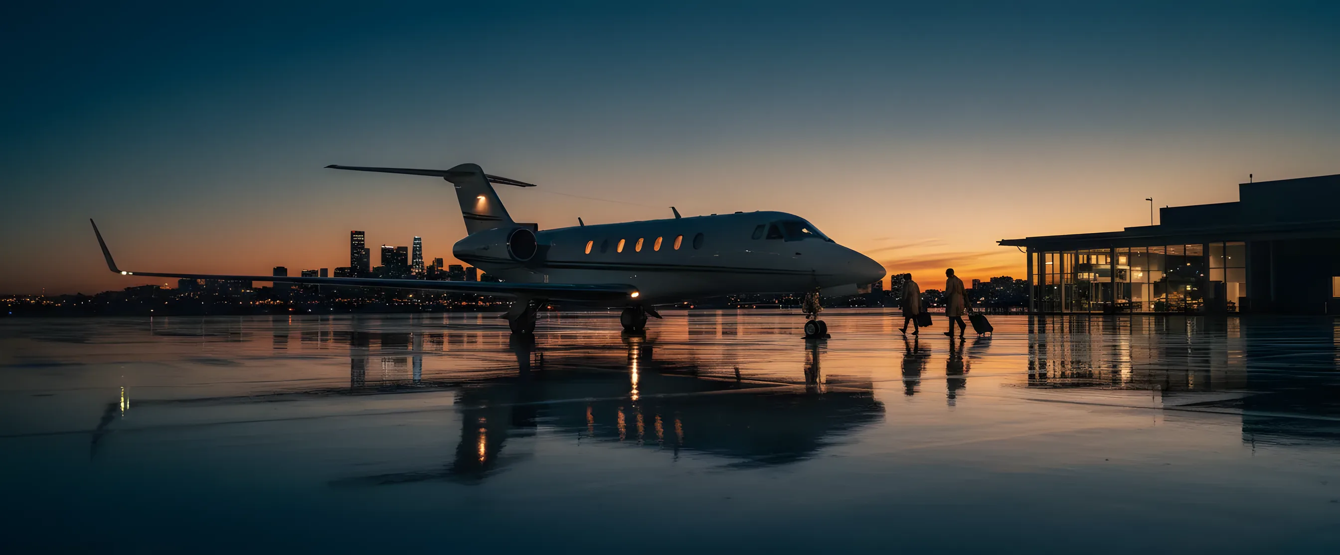 A private jet on an airport tarmac at dusk, with a city skyline glowing in the background.
