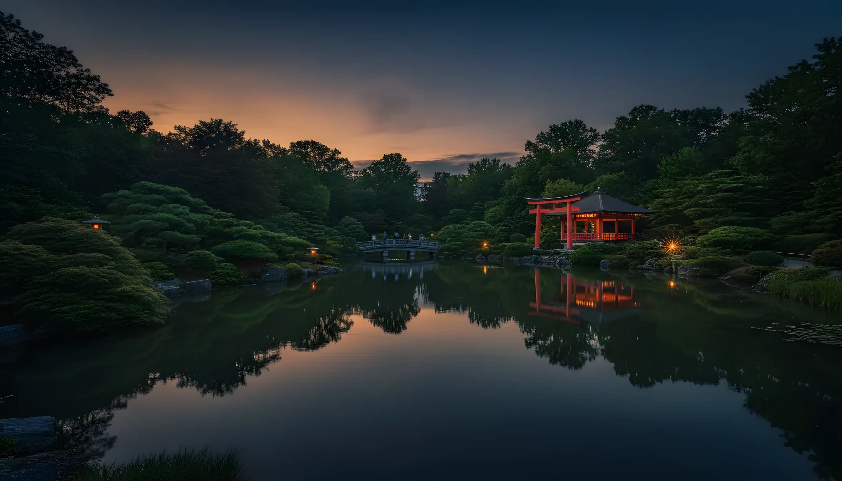 The red Torii gate and pavilion reflected in the pond at the Brooklyn Botanic Garden's Japanese Garden.