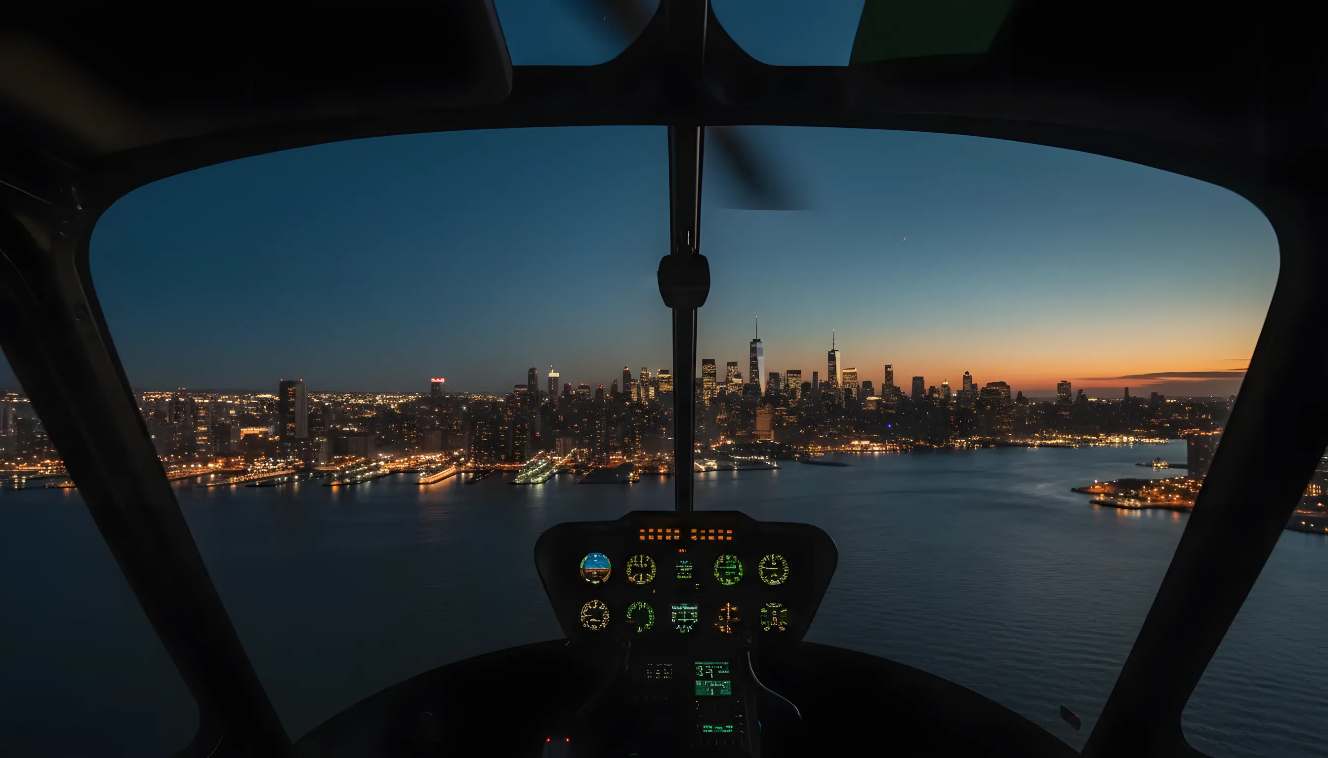 A helicopter flies away from the Manhattan skyline at dusk, with the city lights glowing below.