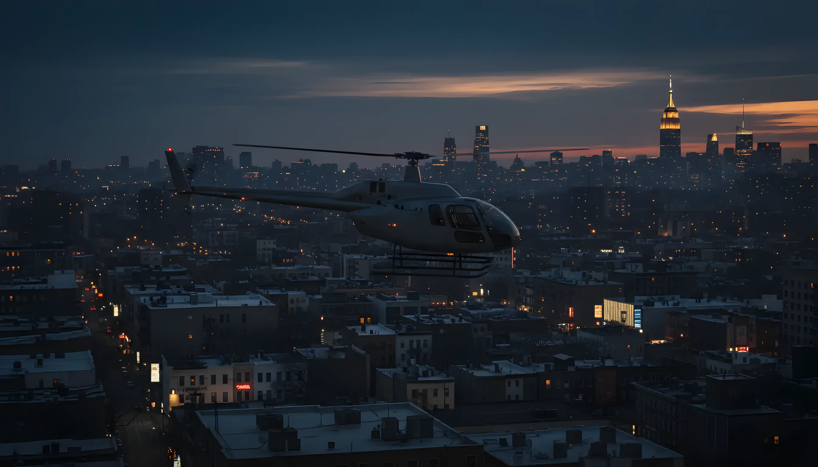 A helicopter flying over Queens toward the Midtown Manhattan skyline at blue hour.