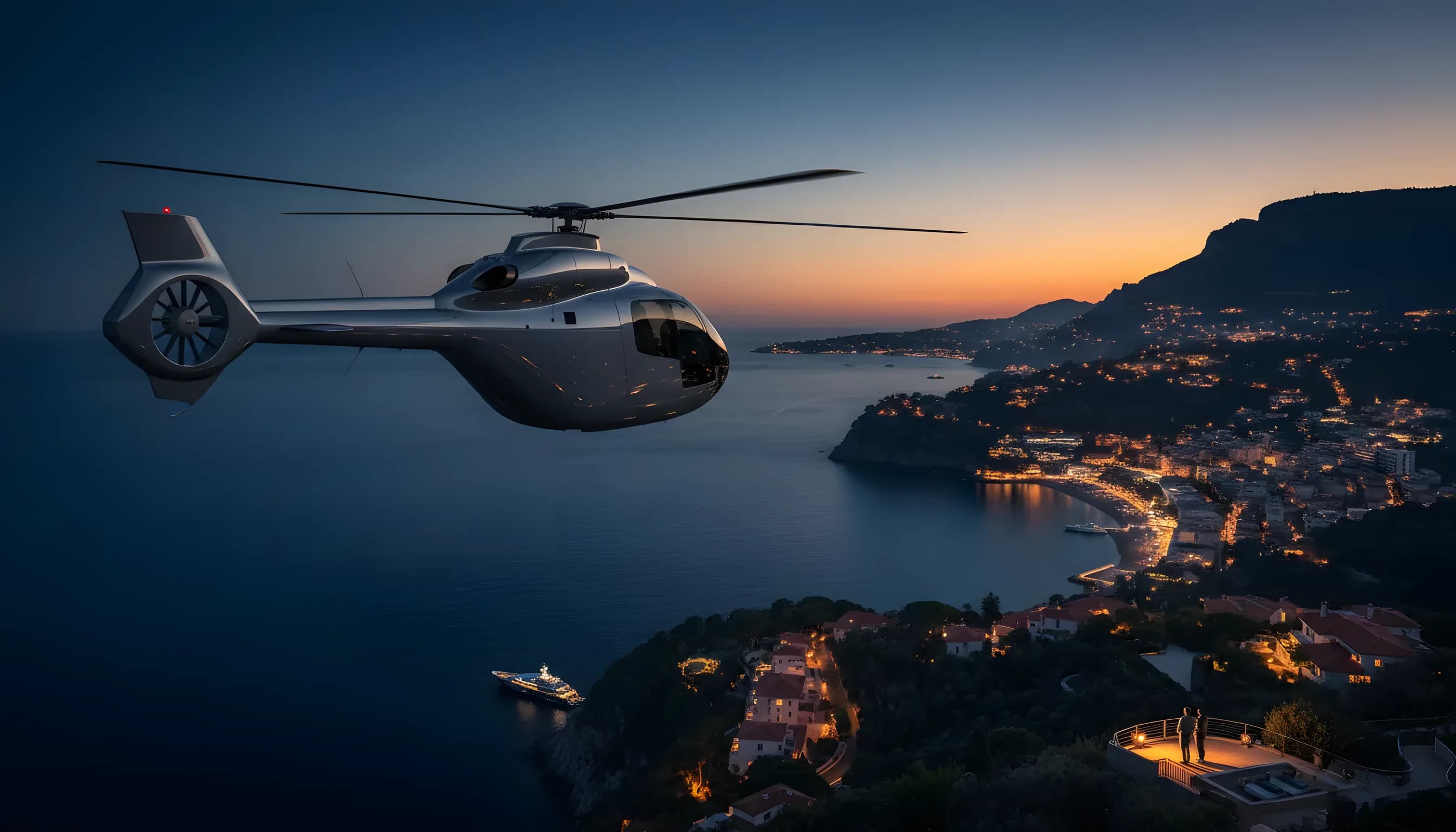 A helicopter flies over the glowing coastline of the French Riviera at dusk.
