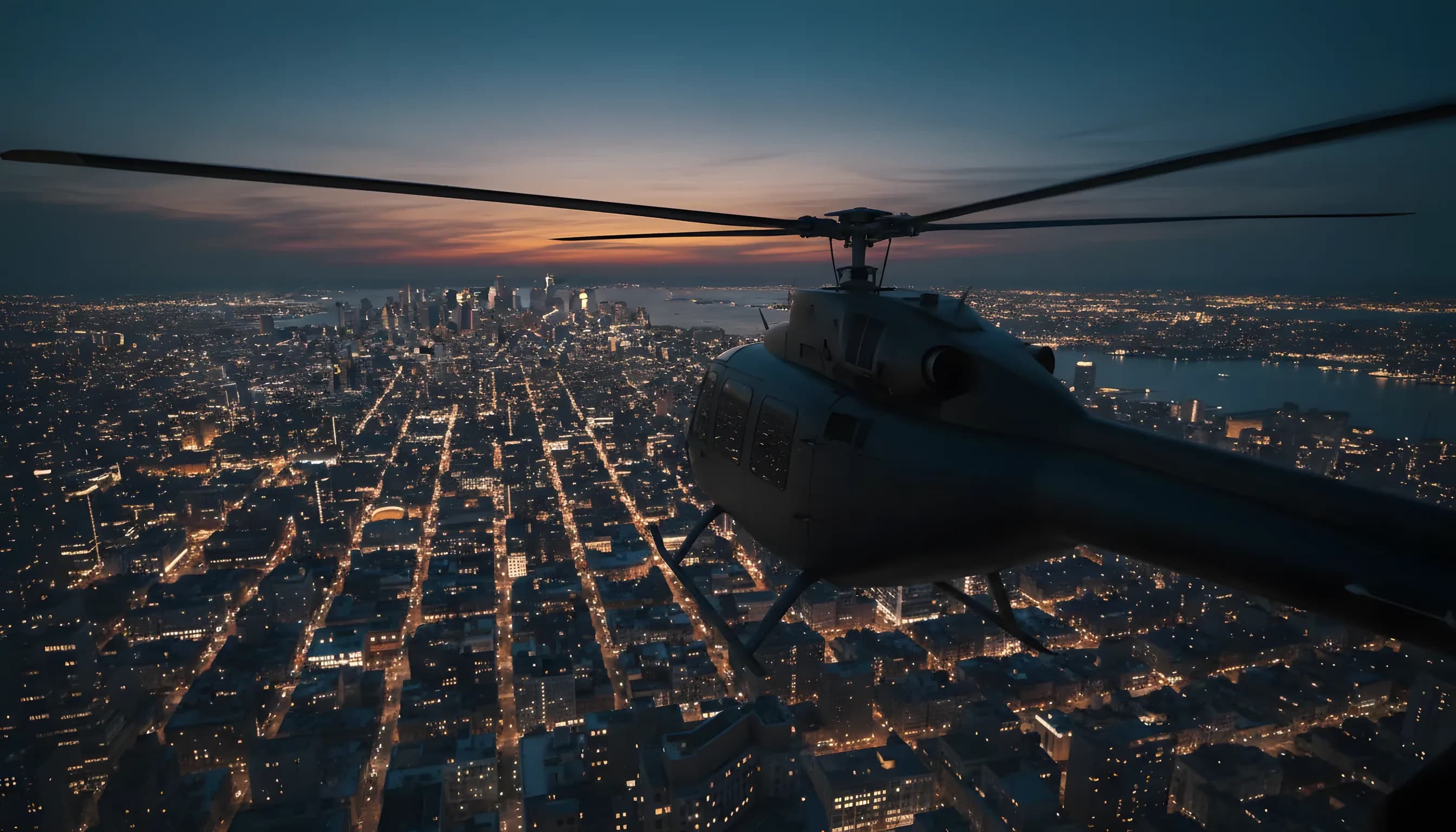 A helicopter flies over the lights of New York City at dusk.