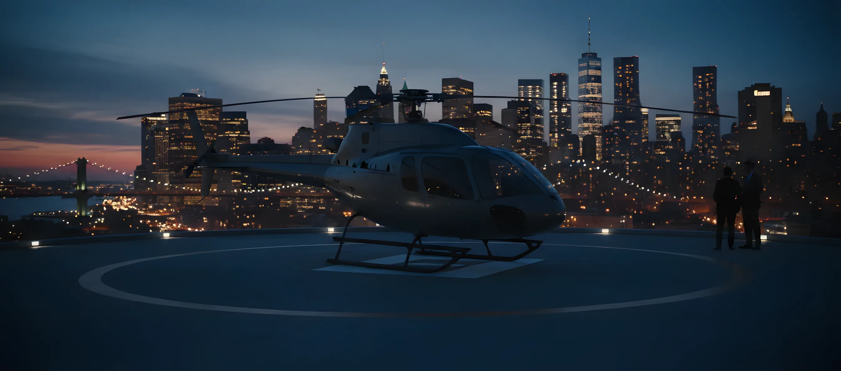 A helicopter on a helipad at dusk, with the glowing Manhattan skyline in the distance.
